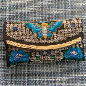 Butterfly crossbody and clutch